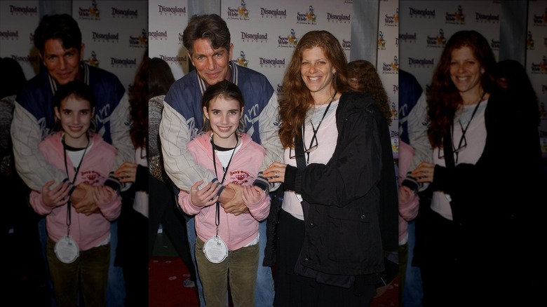 Eric Roberts hugging his daughter Emma Roberts