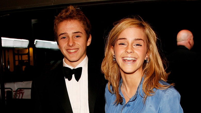 Emma Watson and Alex Watson laughing side by side