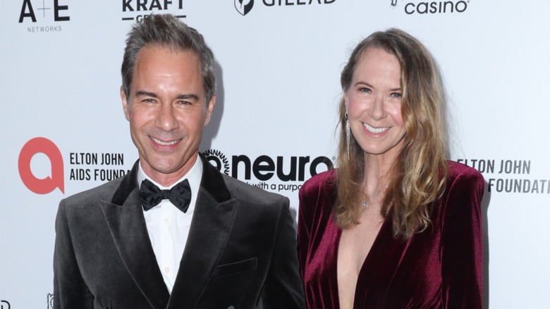Eric McCormack and Janet Holden smiling