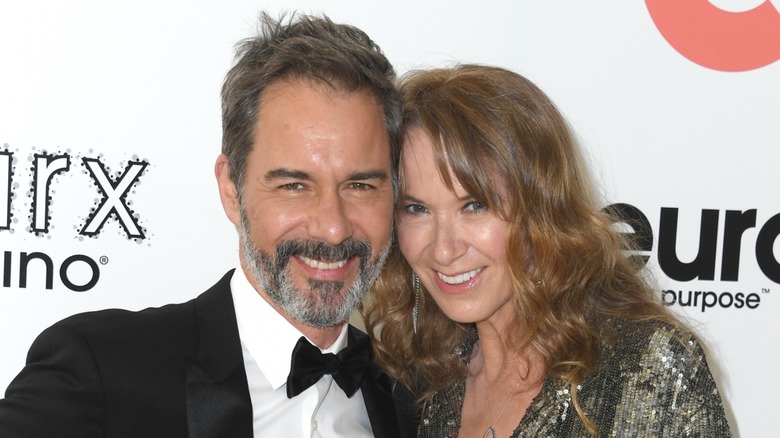 Eric McCormack and Janet Holden smiling