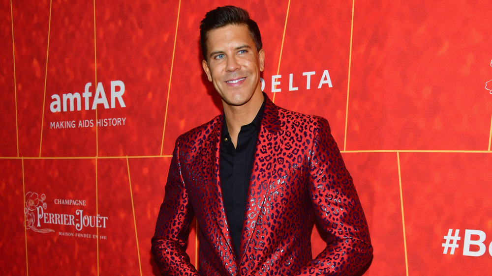 Fredrik Eklund in red jacket at event