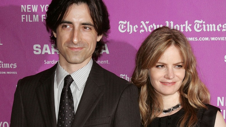 Jennifer Jason Leigh and Noah Baumbach smiling