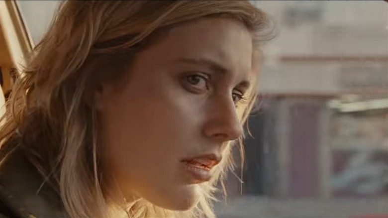 Greta Gerwig driving a car in Greenberg