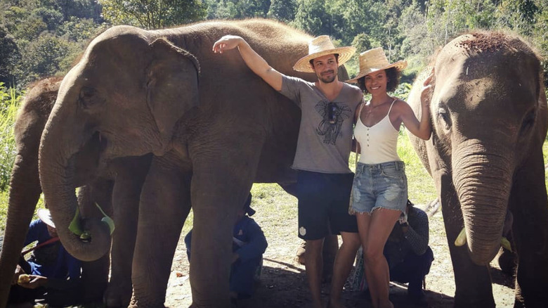 Marco Grazzini and Alvina August with elephants