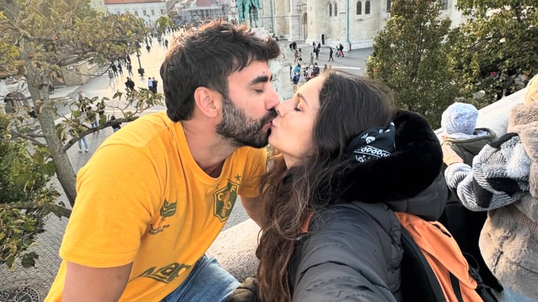 Gabriel Godoy and Raissa Xavier kiss in a photo posted to her Instagram