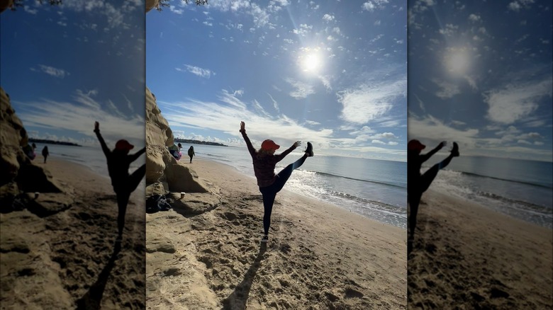 Ali Liebert celebrating sobriety on the beach 