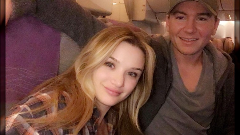 Hunter King posing with Nico Svoboda on a plane