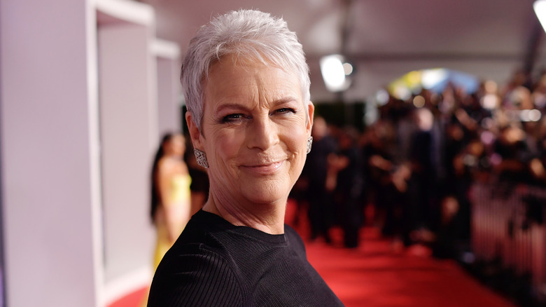 Jamie Lee Curtis smiling and looking at the camera