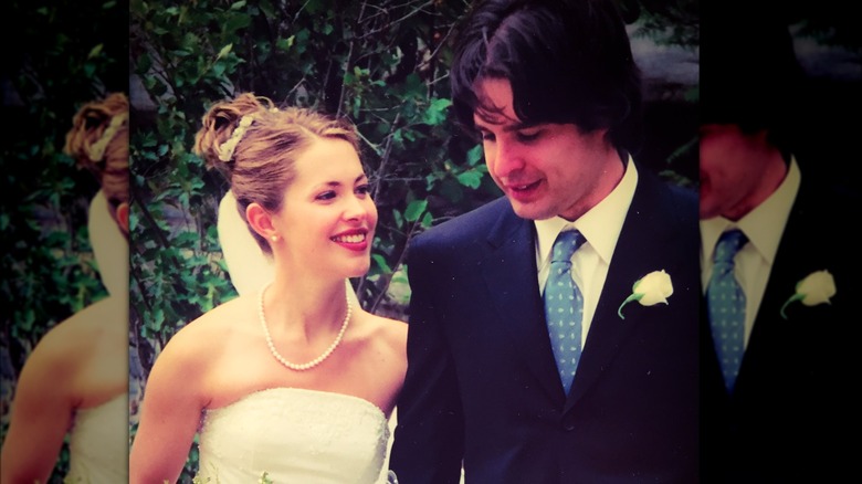 Pascale Hutton and Danny Dorosh smiling in their wedding picture