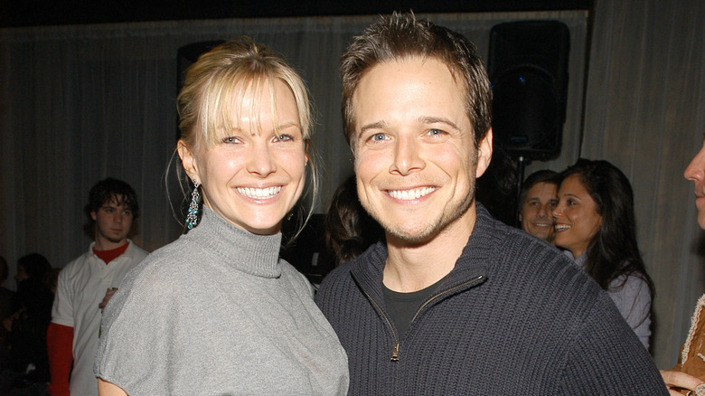 Scott Wolf and Kelley Wolf smiling