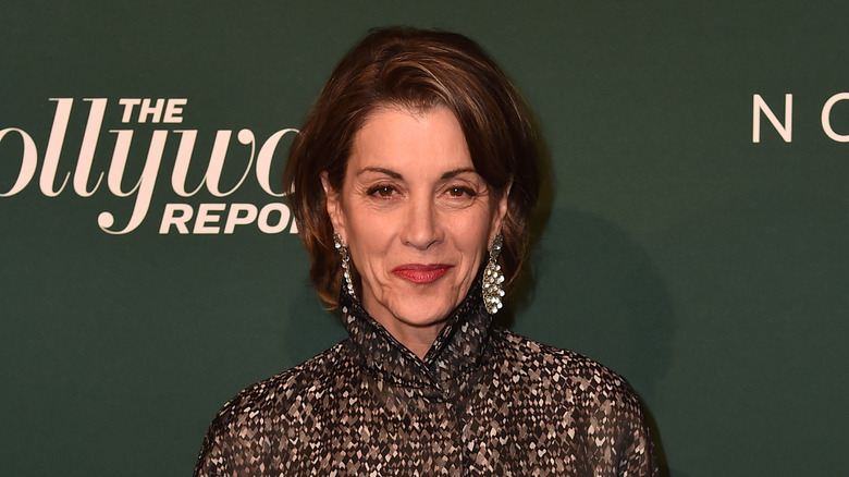 Wendie Malick posing at an event