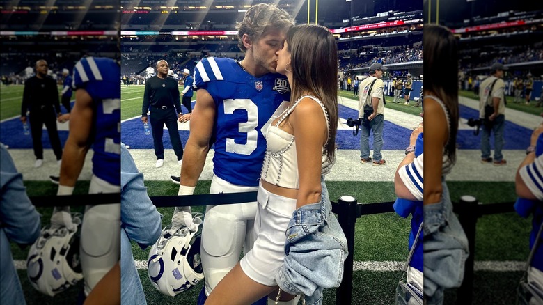 Hannah Ann Sluss kissing Jake Funk at football game