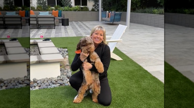 Alisa Funk holding dog 