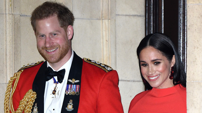 Prince Harry and Meghan Markle smiling