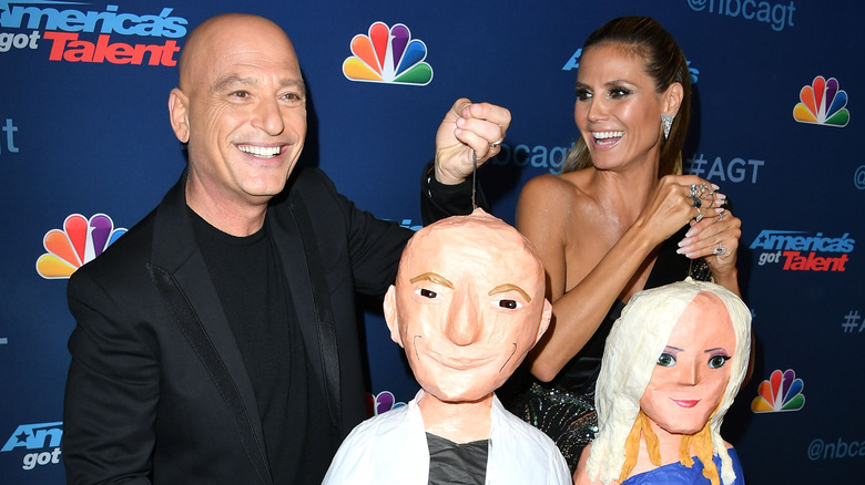 Heidi Klum and Howie Mandel on red carpet