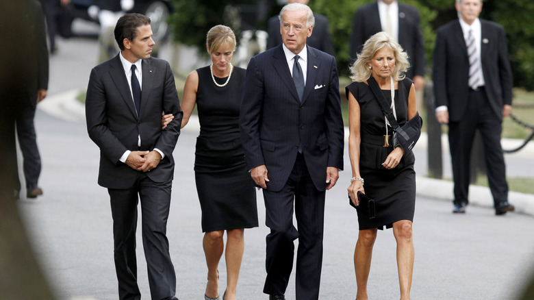 Hunter Biden and Kathleen Buhle attending a funeral