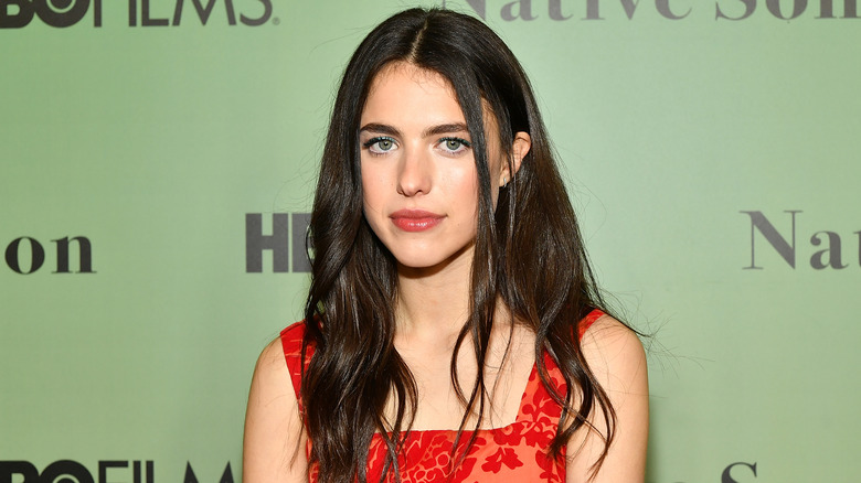Margaret Qualley poses at an event