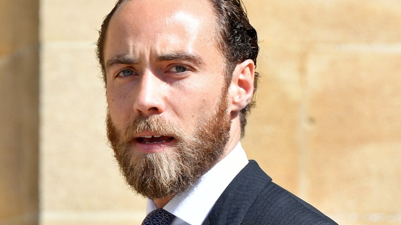 James Middleton staring into camera