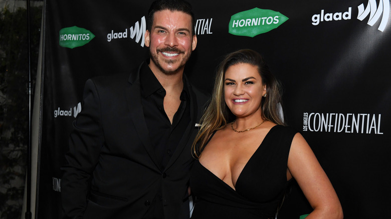 Brittany Cartwright and Jax Taylor smiling for photos