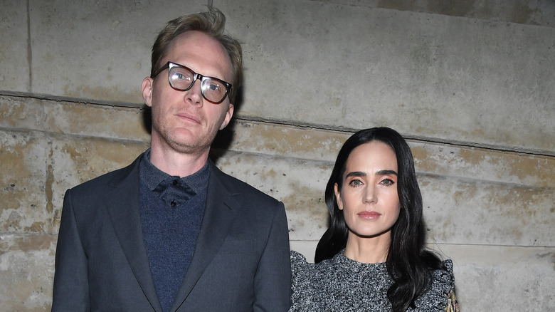 Jennifer Connelly and Paul Bettany standing