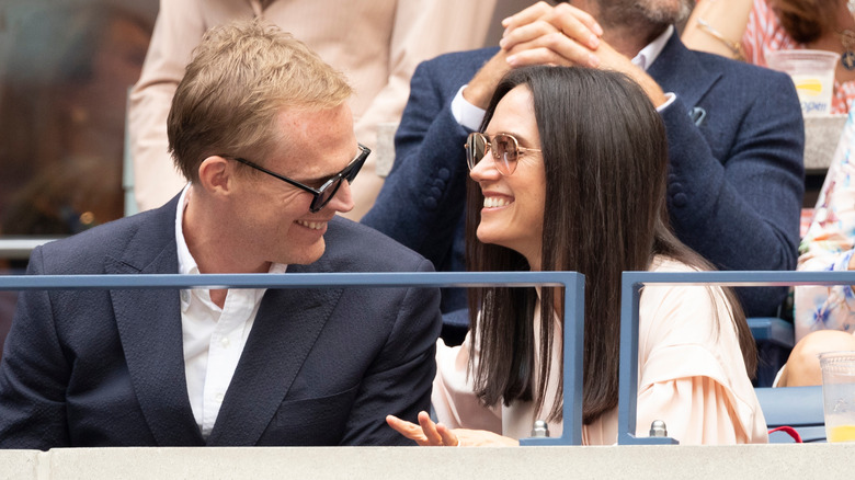 Jennifer Connelly and Paul Bettany laughing