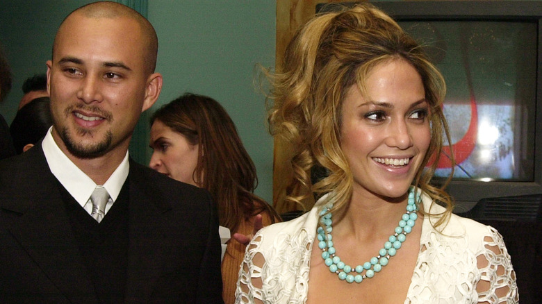 Jennifer Lopez and Cris Judd smiling