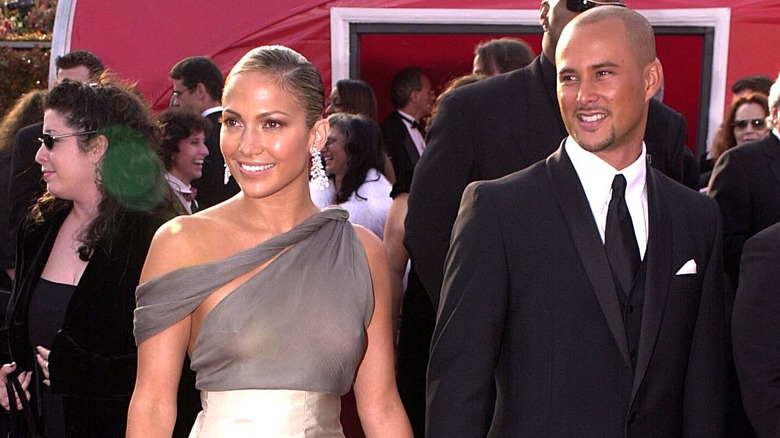 Jennifer Lopez and Cris Judd posing