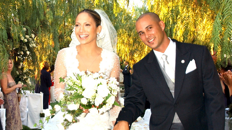 Jennifer Lopez and Cris Judd walking down the aisle