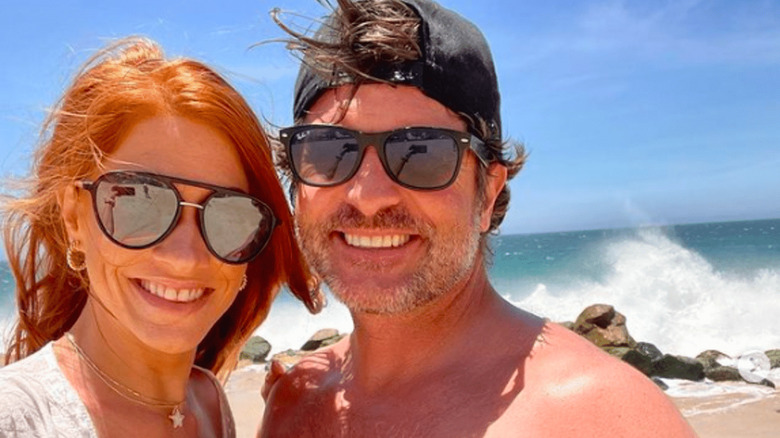 Jennifer and Mike Todryk on a beach