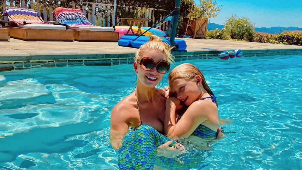 Jessica Simpson and her daughter in their pool