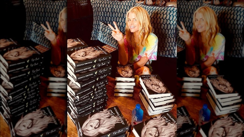 Jessica Simpson with her books in her home