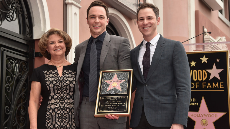 Judy Parsons, Jim Parsons, and Todd Spiewak pose for a photo with Jim's Star on The Hollywood Walk of Fame