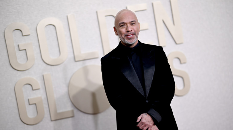 Jo Koy smiling at the Golden Globes