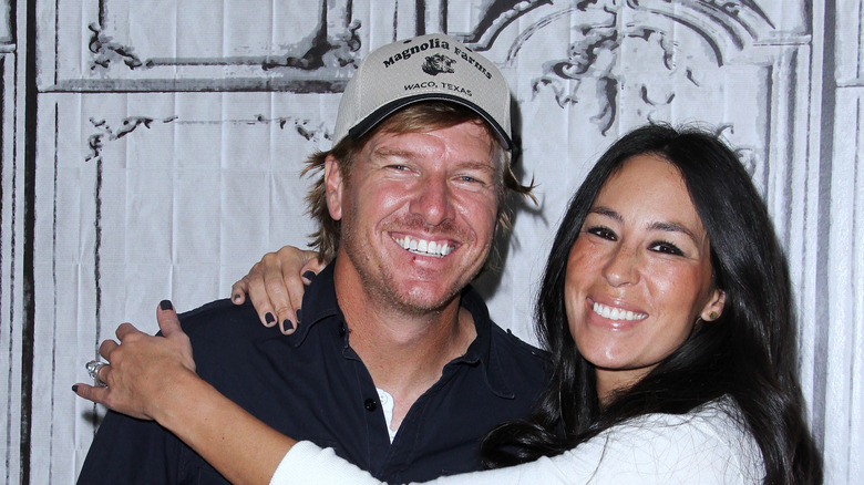 Chip and Joanna Gaines hugging 