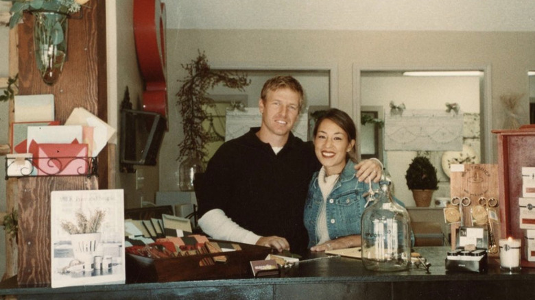 Chip and Joanna Gaines posing in old store