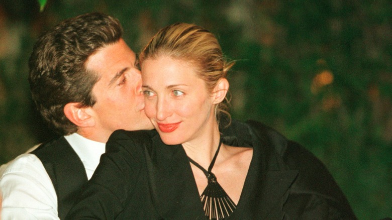 JFK Jr kissing Carolyn Bessette