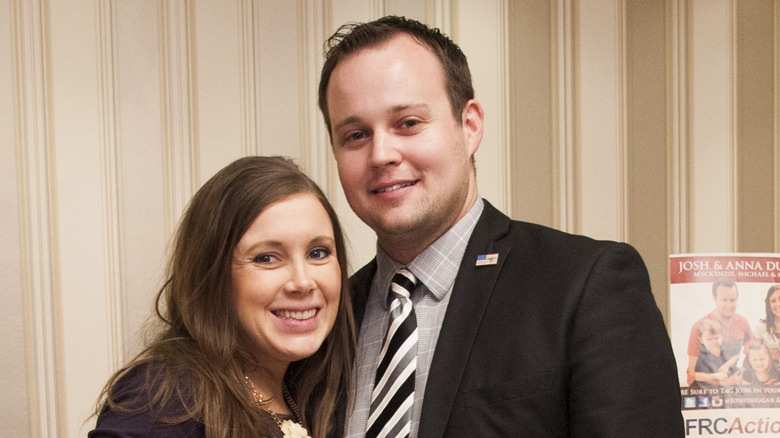 Josh and Anna Duggar pose at an event