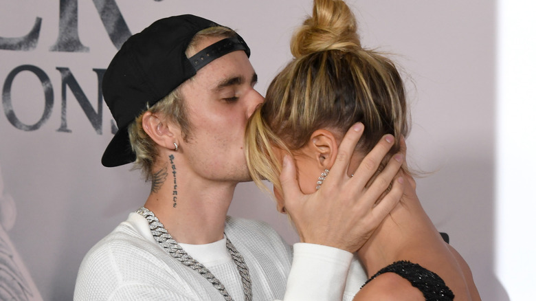 Justin kisses Hailey's forehead