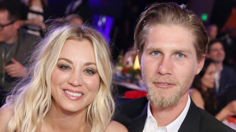 Kaley Cuoco and Karl Cook snuggle up together at an event