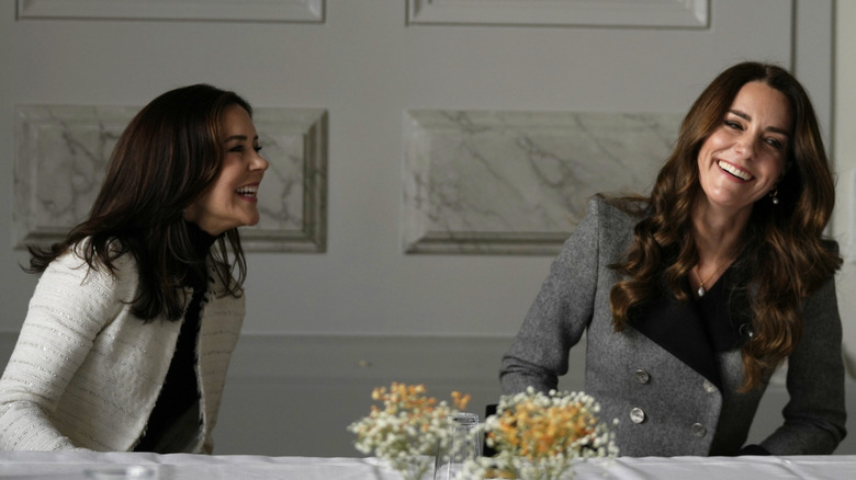 Princess Mary and Princess Catherine laughing