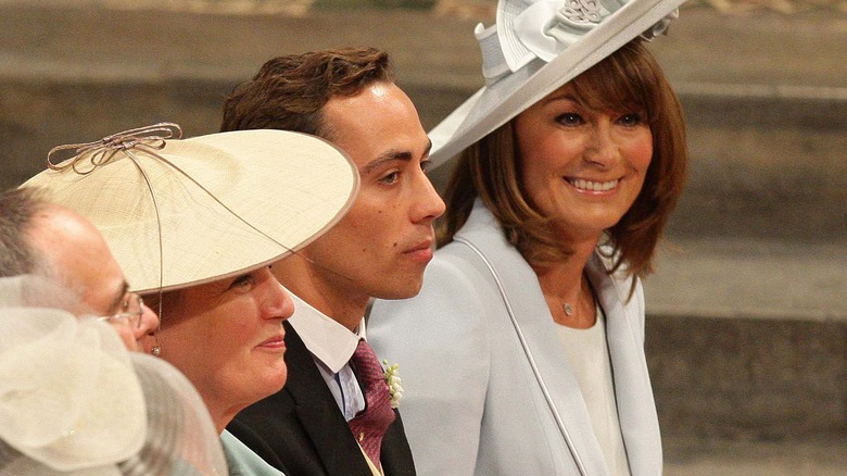 James Middleton seated with family