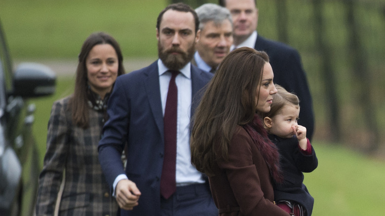 James and Catherine walking to church