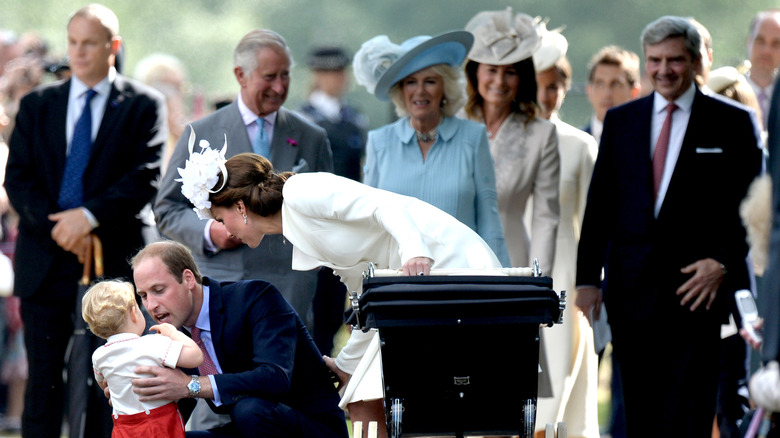 Kate Middleton and Prince William speaking to George 