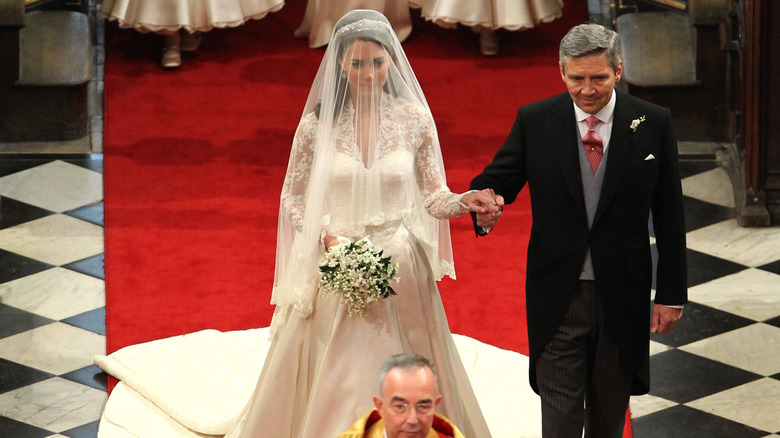 Kate and Michael Middleton walking down isle at wedding