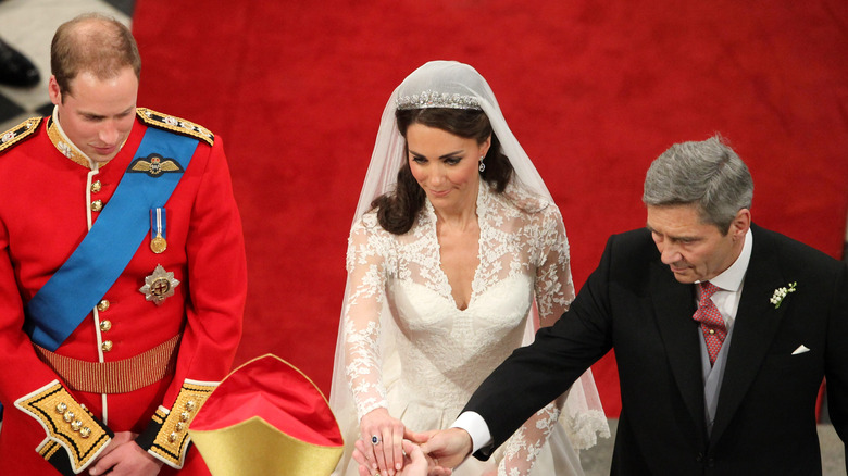 Prince William and Kate Middleton on their wedding day with Michael