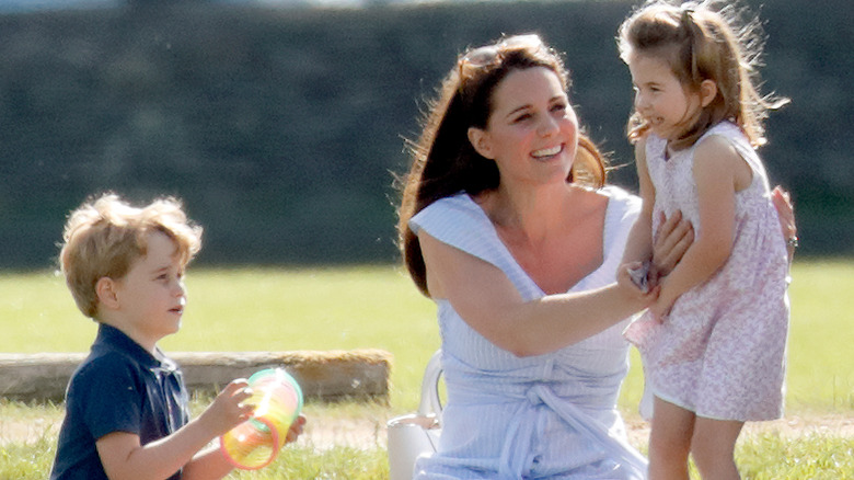 Kate Middleton with little Charlotte and George 