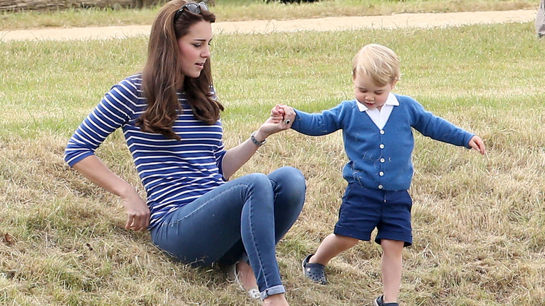 Prince George and Kate Middleton playing outside