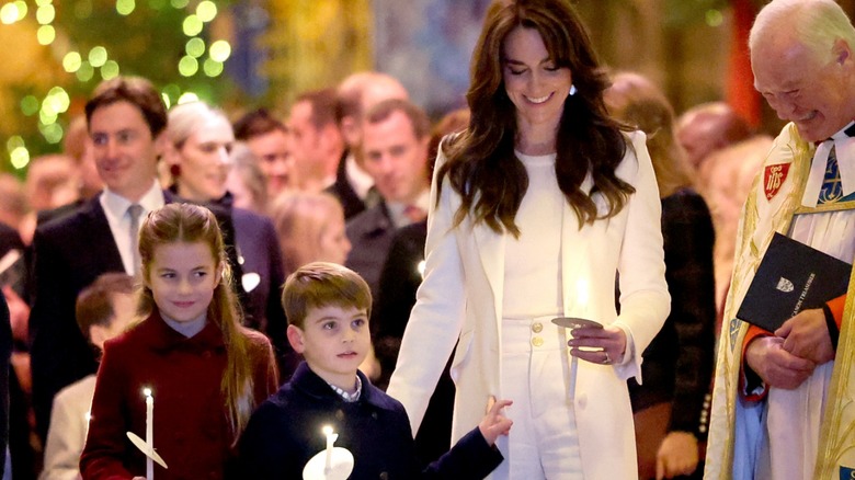 Princess Catherine and Princess Charlotte and Prince Louis in church