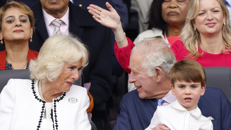King Charles and Queen Camilla with Prince Louis