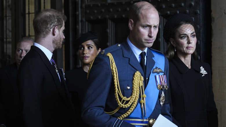 Kate Middleton with Prince William, Prince Harry, and Meghan Markle